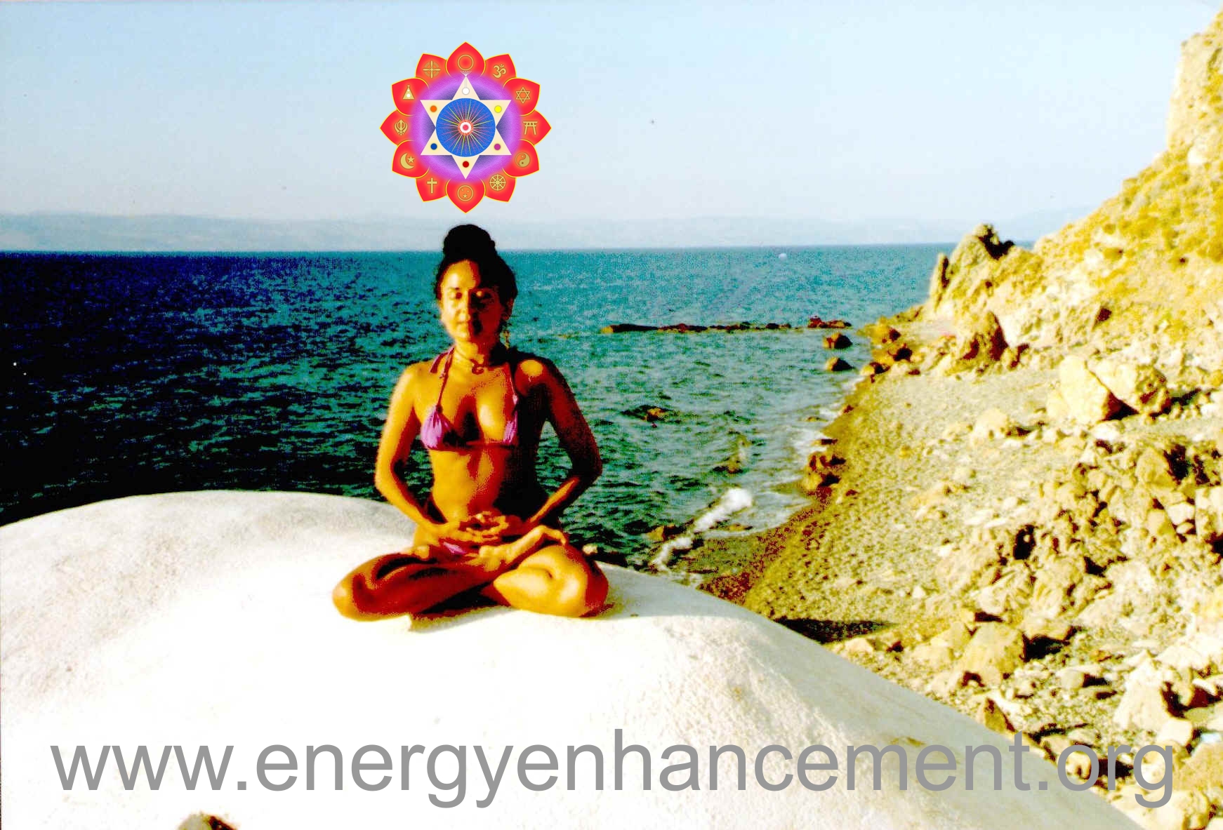 DEVI DHYANI IN LOTUS POSTURE FOCUSSING ON THE SOUL CHAKRA ABOVE THE HEAD AND THE KUNDALINI CHAKRA IN THE CENTER OF THE EARTH SPHERE..